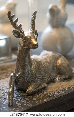 Stock Photo - Christmas deer figurine. Fotosearch