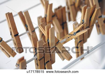Clothes pegs on clothesline View Large Photo Image Stock Photography - Clothes pegs on clothesline. Fotosearch