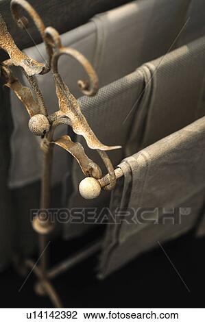 Stock Image - Cloths on towel holder. Fotosearch