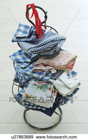 Cloths on étagère View Large Photo Image Stock Photo - Cloths on étagère. Fotosearch