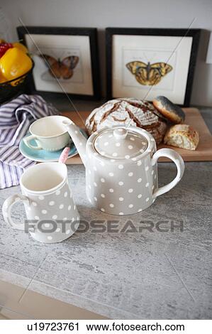 Coffee set, bread and butterfly pictures View Large Photo Image Stock Image - Coffee set, bread and butterfly pictures. Fotosearch