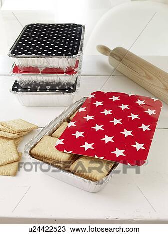 Stock Image - Cookies in disposable packages. Fotosearch