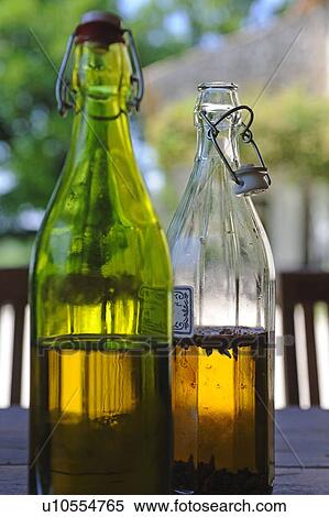 Cooking oil in glass bottles View Large Photo Image Stock Photography - Cooking oil in glass bottles. Fotosearch