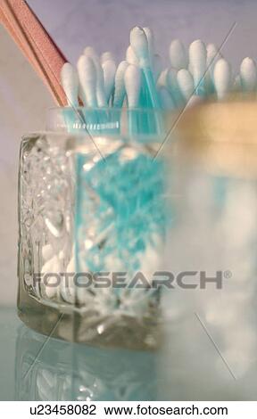 Cotton buds in glass receptacle View Large Photo Image Stock Image - Cotton buds in glass receptacle. Fotosearch