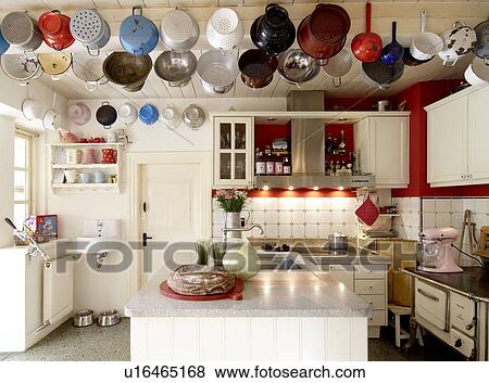 Country kitchen with sifters on the ceiling View Large Photo Image Stock Photo - Country kitchen with sifters on the ceiling. Fotosearch
