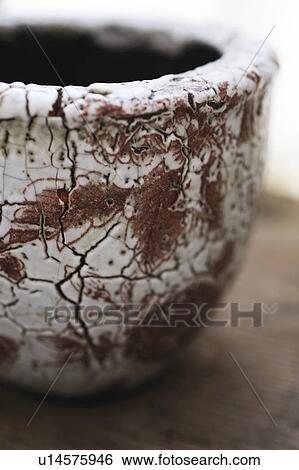 Stock Photograph - Cracked earthenware bowl. Fotosearch