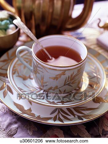Cup of tea outdoors View Large Photo Image Stock Photograph - Cup of tea outdoors. Fotosearch