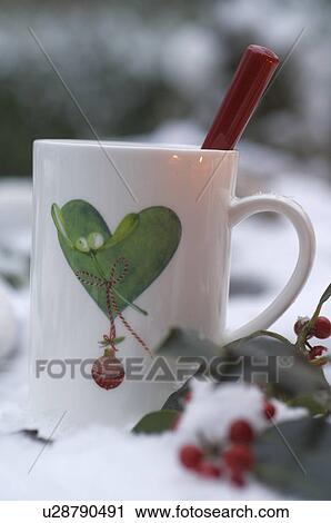 Cup with heart-shaped imprint and twig View Large Photo Image Stock Image - Cup with heart-shaped imprint and twig. Fotosearch