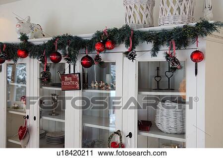 Cupboard with Christmas decoration View Large Photo Image Stock Image - Cupboard with Christmas decoration. Fotosearch