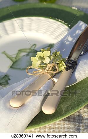 Cutlery and napkin on table View Large Photo Image Stock Image - Cutlery and napkin on table. Fotosearch