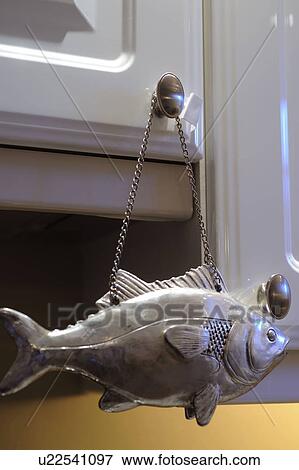 Decorative fish hanging at handle View Large Photo Image Stock Photo - Decorative fish hanging at handle. Fotosearch