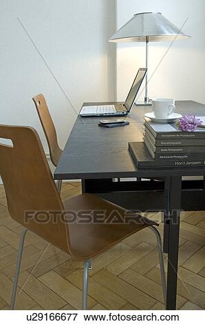 Desk with lamp and laptop View Large Photo Image Stock Photo - Desk with lamp and laptop. Fotosearch