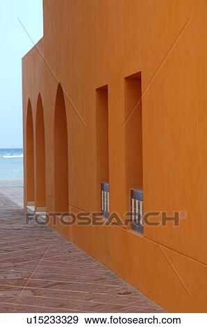 Stock Photo - Detail of a house, walkway and ocean. Fotosearch