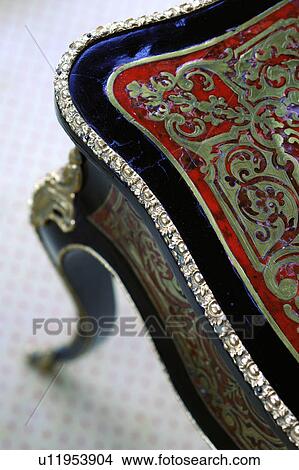 Picture - Detail of an ornate antique table. Fotosearch