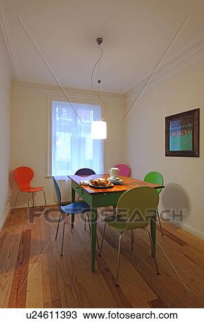 Dining room with colorful chairs View Large Photo Image Stock Image - Dining room with colorful chairs. Fotosearch