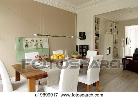 Dining room with view into living room View Large Photo Image Stock Photo - Dining room with view into living room. Fotosearch