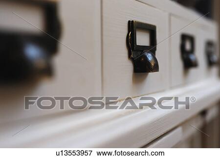 Stock Photo - Drawers at a desk. Fotosearch