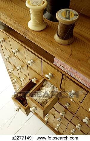 Dresser with bobbin thread and many drawers View Large Photo Image Stock Image - Dresser with bobbin thread and many drawers. Fotosearch