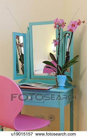 Dressing table with mirror and orchid View Large Photo Image Stock Photo - Dressing table with mirror and orchid. Fotosearch