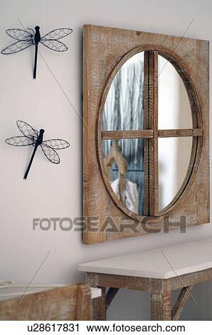 Dressing table with mirror and decorative dragonflies on the wall View Large Photo Image Stock Image - Dressing table with mirror and decorative dragonflies on the wall. Fotosearch
