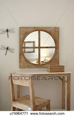 Dressing table with mirror and wooden chair View Large Photo Image Stock Image - Dressing table with mirror and wooden chair. Fotosearch