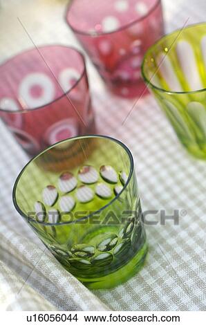Drinking glasses on checkered tablecloth View Large Photo Image Picture - Drinking glasses on checkered tablecloth. Fotosearch