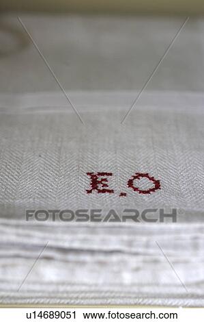 Stock Image - Embroidered initials in cloth. Fotosearch