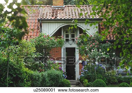 Stock Image - Entrance to a country house. Fotosearch