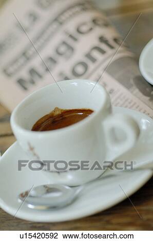Espresso and newspaper View Large Photo Image Stock Image - Espresso and newspaper. Fotosearch
