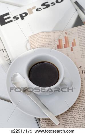 Espresso and newspaper View Large Photo Image Stock Photography - Espresso and newspaper. Fotosearch
