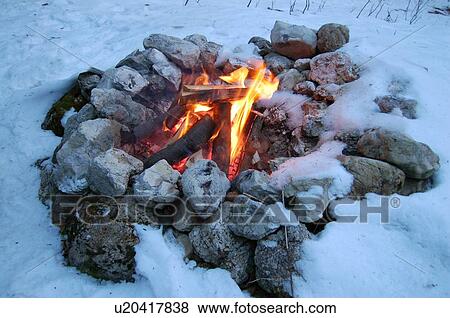 Stock Photo - Fire in snow. Fotosearch