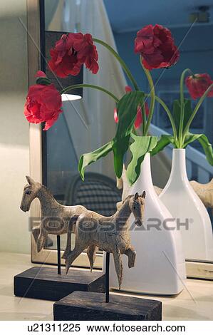 Flowers and horse figurines at mirror View Large Photo Image Stock Photography - Flowers and horse figurines at mirror. Fotosearch