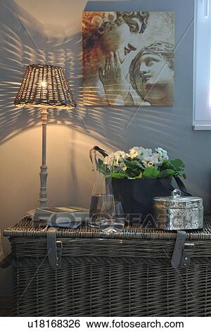 Stock Photograph - Flowers, water, lamp and painting. Fotosearch