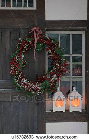 Front door with Christmas wreath and windlights View Large Photo Image Stock Image - Front door with Christmas wreath and windlights. Fotosearch