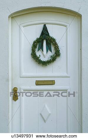 Front door with Christmas wreath View Large Photo Image Stock Image - Front door with Christmas wreath. Fotosearch