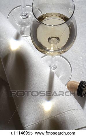 Glass of white wine and napkin View Large Photo Image Stock Photography - Glass of white wine and napkin. Fotosearch