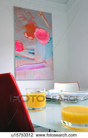 Glasses with orange juice on dining table View Large Photo Image Stock Image - Glasses with orange juice on dining table. Fotosearch