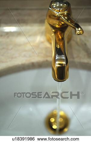 Golden water tap View Large Photo Image Stock Photograph - Golden water tap. Fotosearch