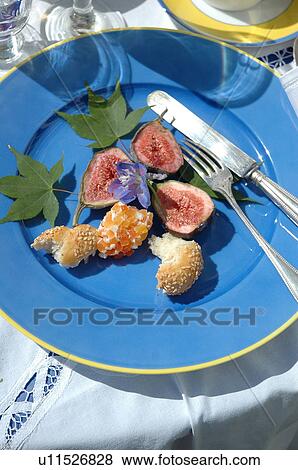 Halved figs and garnish on plate View Large Photo Image Stock Photo - Halved figs and garnish on plate. Fotosearch