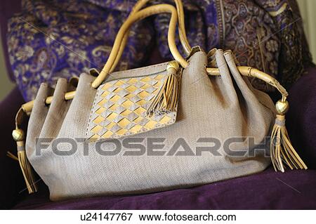Handbag on couch View Large Photo Image Stock Photo - Handbag on couch. Fotosearch