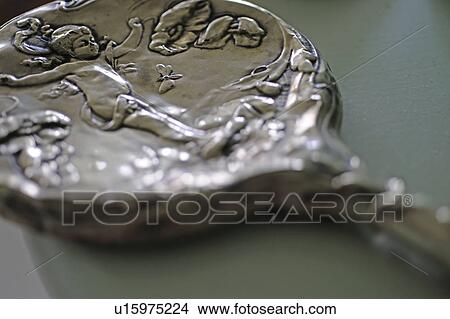 Picture - Handicraft object with angel imprint. Fotosearch
