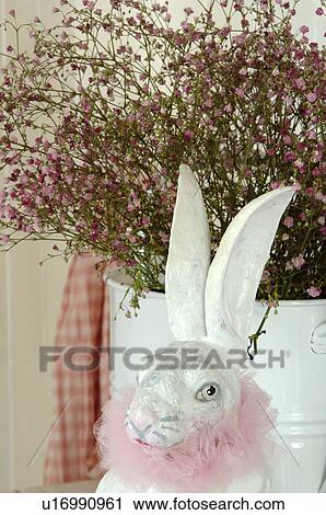 Hare figurine at flower View Large Photo Image Stock Image - Hare figurine at flower. Fotosearch
