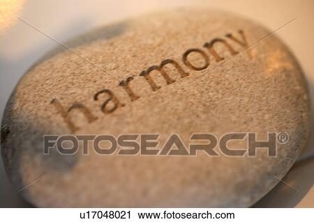 Harmony written on worry stone View Large Photo Image Stock Image - Harmony written on worry stone. Fotosearch