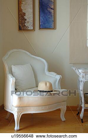 Stock Photo - Hat on armchair. Fotosearch