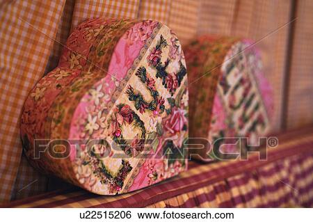 Stock Photograph - Heart-shaped box with inscription Love. Fotosearch