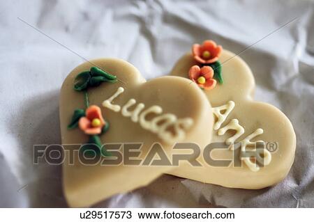 Heart-shaped confectionary with forenames View Large Photo Image Stock Image - Heart-shaped confectionary with forenames. Fotosearch