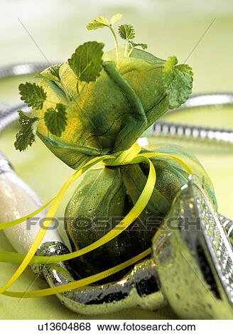 Herb sachet and shower head View Large Photo Image Stock Photo - Herb sachet and shower head. Fotosearch