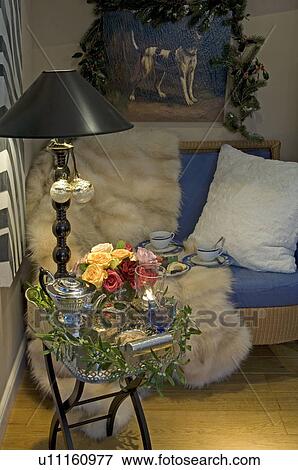 Interior with flowers, lamp, tea service and painting View Large Photo Image Stock Photo - Interior with flowers, lamp, tea service and painting. Fotosearch