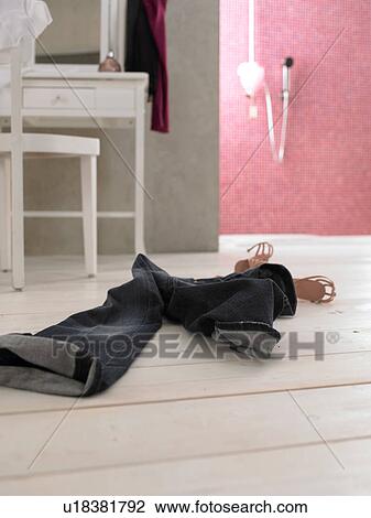 Jeans and womens shoes on wooden floor View Large Photo Image Stock Image - Jeans and womens shoes on wooden floor. Fotosearch