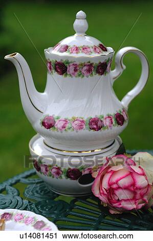 Jug on a tea warmer View Large Photo Image Stock Image - Jug on a tea warmer. Fotosearch